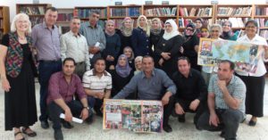 Capacitar training for Palestinian teachers and counselors of the Jenin Ministry of Education, which includes two Presentation Sisters from India on the right, holding the world map.