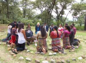 Mayan health promoters from Quiche, Guatemala, praying for the Capacitar groups in Afghanistan.